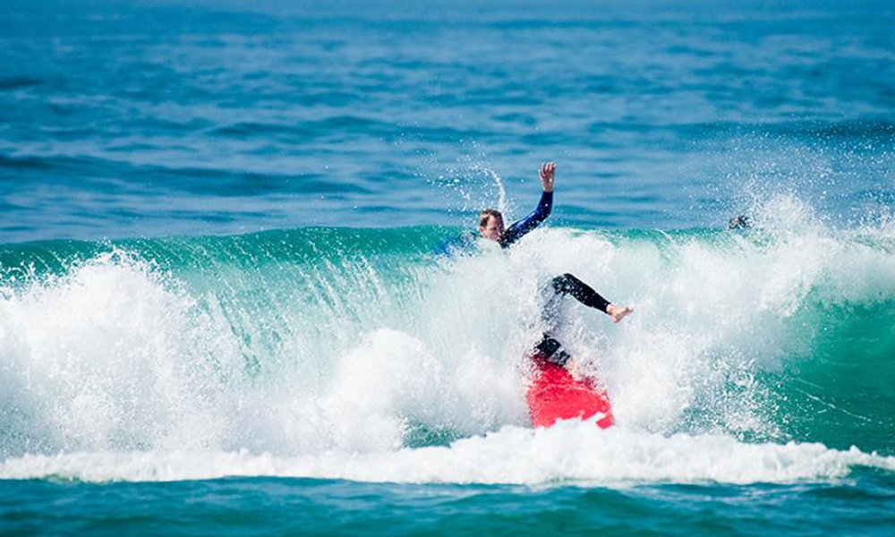 Surf student wipe-out in Ericeira