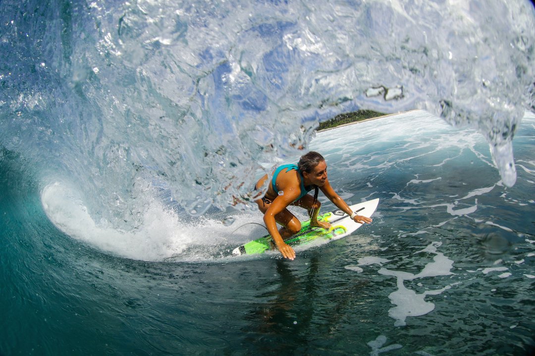 Female surfer in the Mentawais