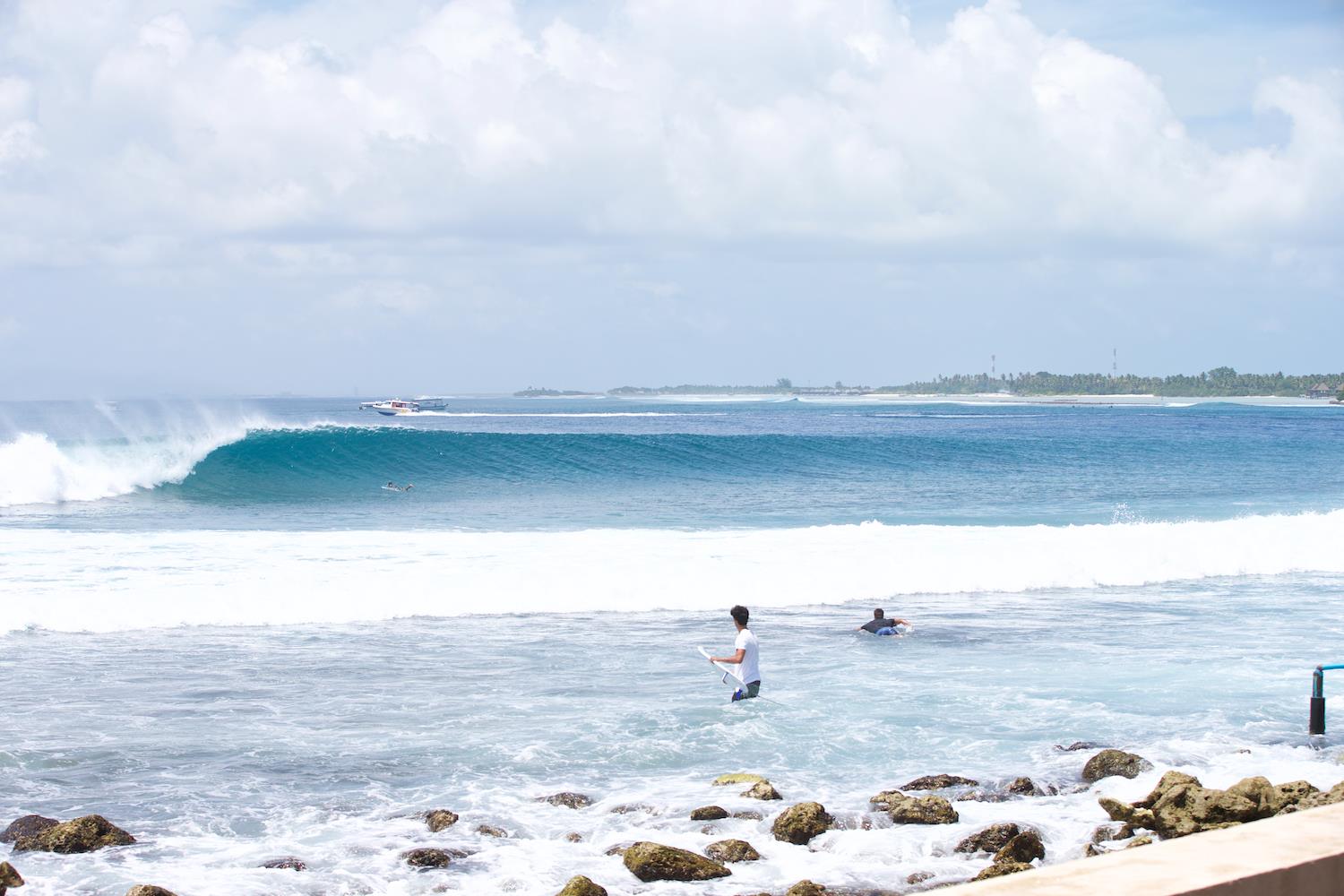 Surfing at Lohis, Maldives