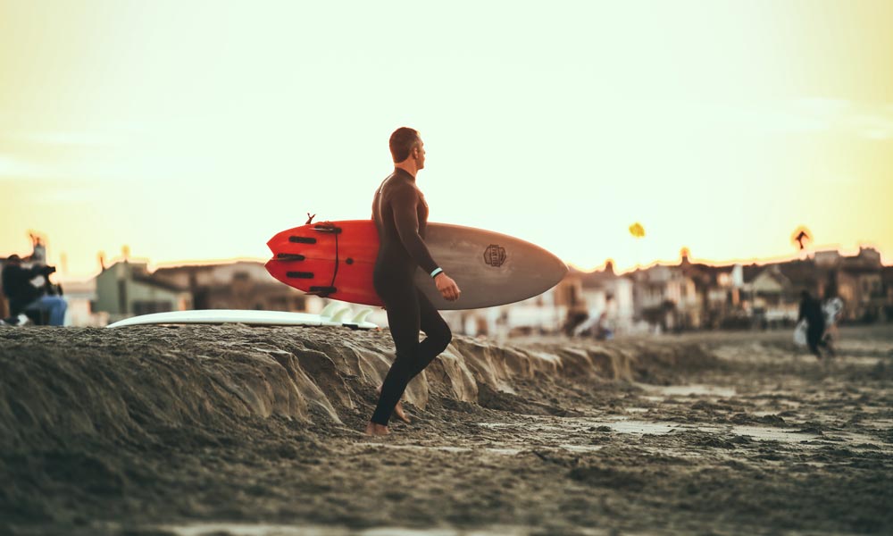 Surfer with wider surfboard